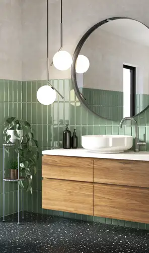 Sydney bathroom renovation with timber vanity – WizBuilt modern Sydney bathroom renovation with green tiled walls and timber vanity