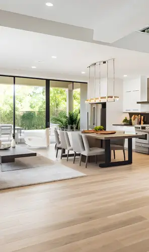 Sydney open-plan living renovation – WizBuilt modern open-plan living and kitchen renovation with timber flooring in a Sydney home